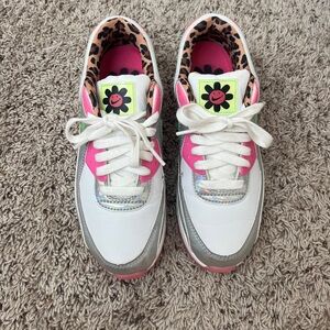 Nike Air Max’s pink and metallic with hints of green
